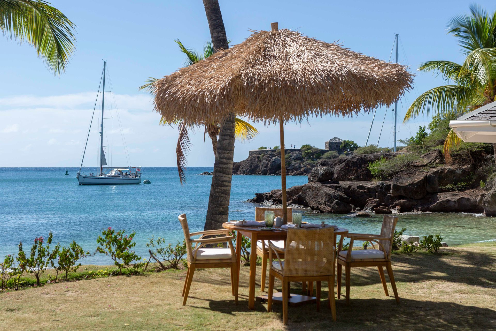 Beachfront dining under palapa at The Inn at English Harbour